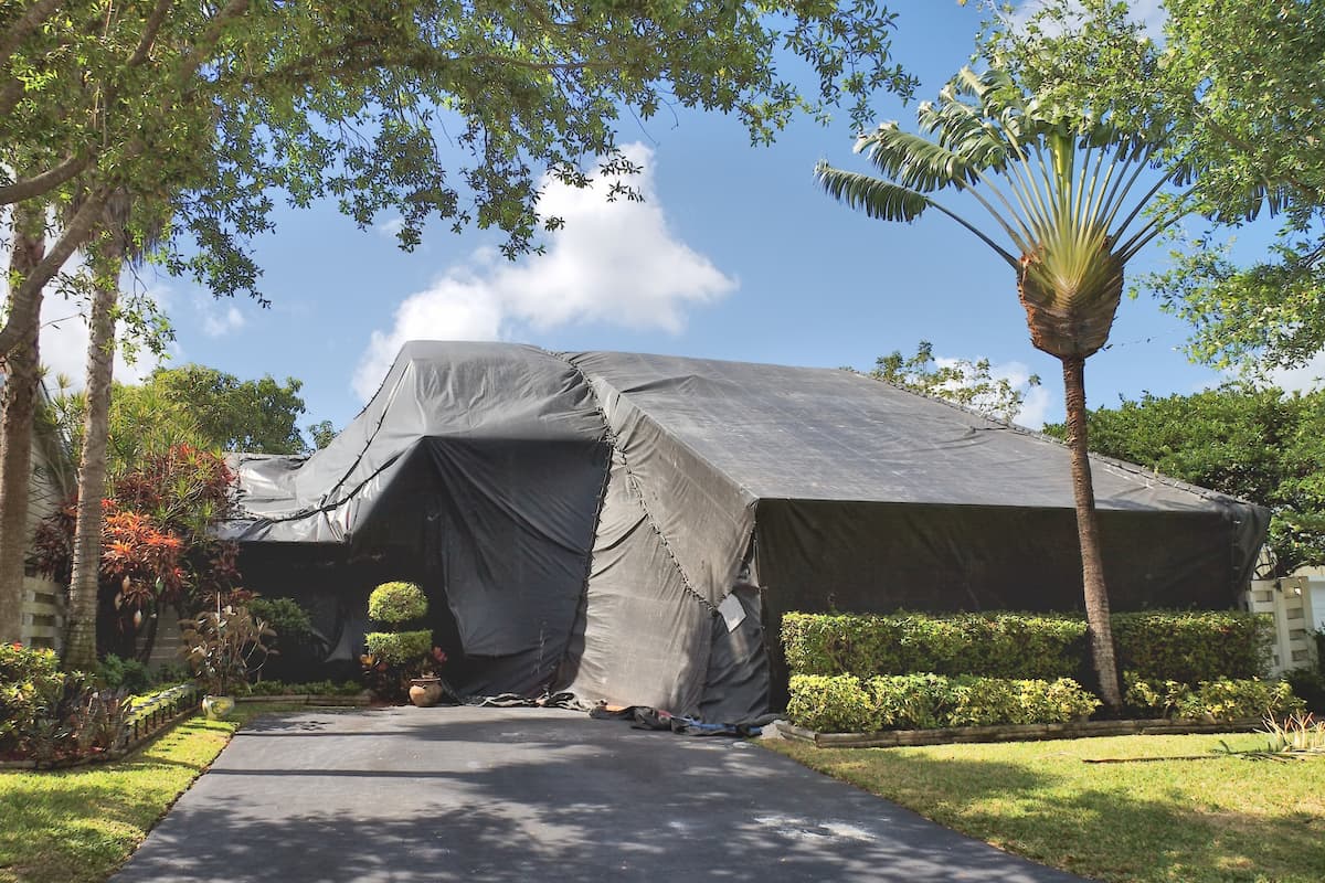 A house is tented to exterminate termites and other insects. 