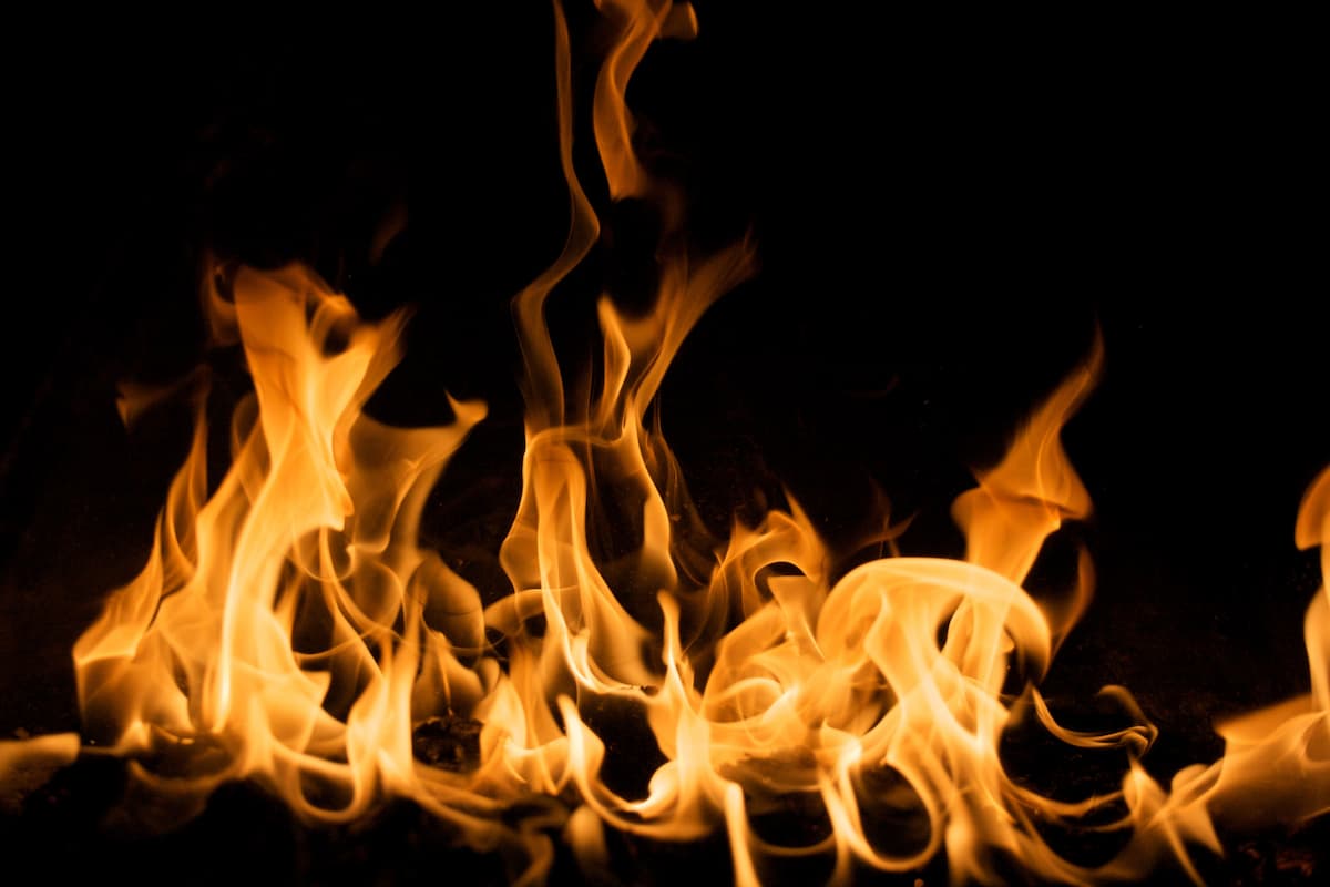 Close-up photo of a fire in a fireplace. 