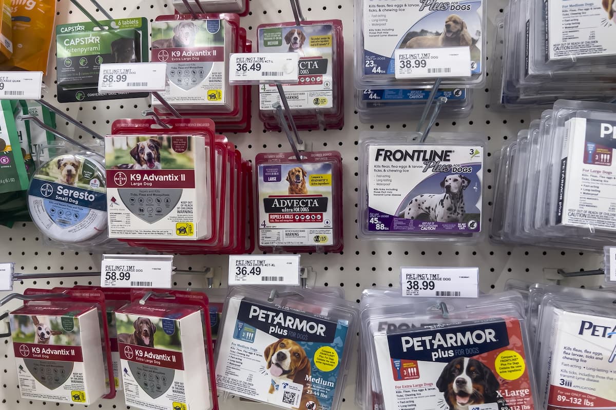 Flea and tick treatments are being sold in a pet store.  